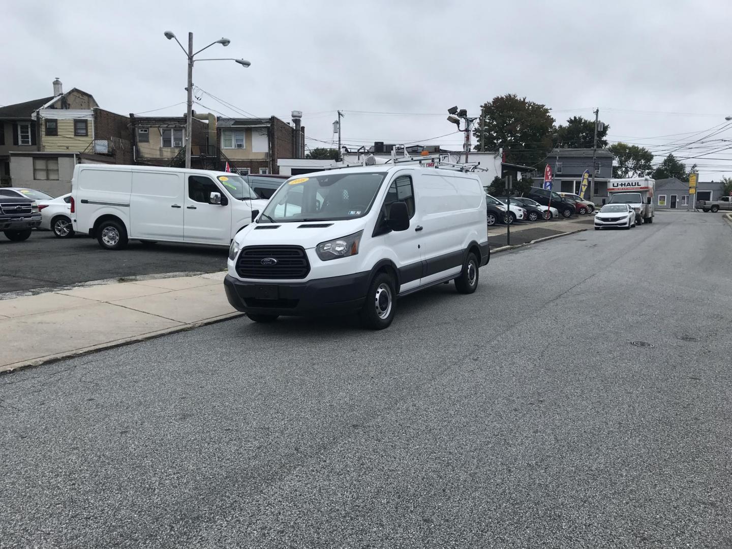 2016 White /Gray Ford Transit 150 Van Low Roof w/Sliding Pass. 130-in. WB (1FTYE1YM6GK) with an 3.7L V6 DOHC 24V engine, 6A transmission, located at 577 Chester Pike, Prospect Park, PA, 19076, (610) 237-1015, 39.886154, -75.302338 - Photo#1