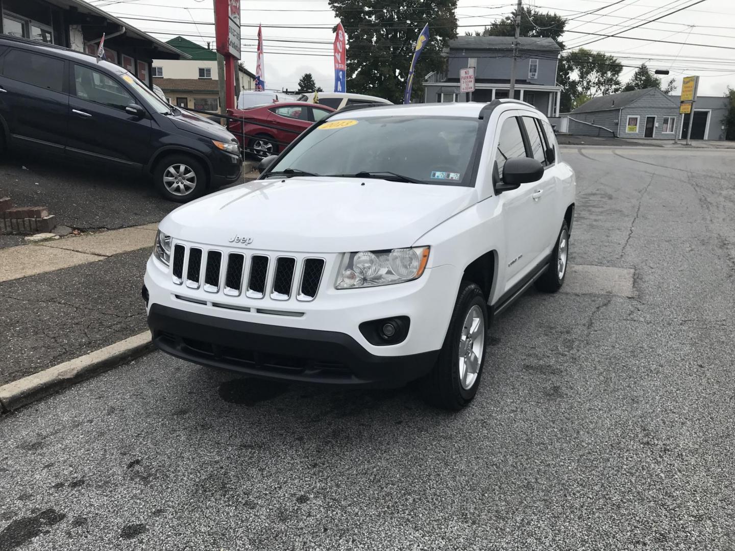 2013 White /Gray Jeep Compass Sport (1C4NJCBA4DD) with an 2.0L L4 DOHC 16V engine, Automatic transmission, located at 577 Chester Pike, Prospect Park, PA, 19076, (610) 237-1015, 39.886154, -75.302338 - 2013 Jeep Compass: Only 93k miles, great on gas, new PA inspection, SUPER CLEAN, runs LIKE NEW! This vehicle comes inspected and has been given a bumper to bumper safety check. It is very clean, reliable, and well maintained. We offer a unique pay plan that is known for being the easiest and fast - Photo#1