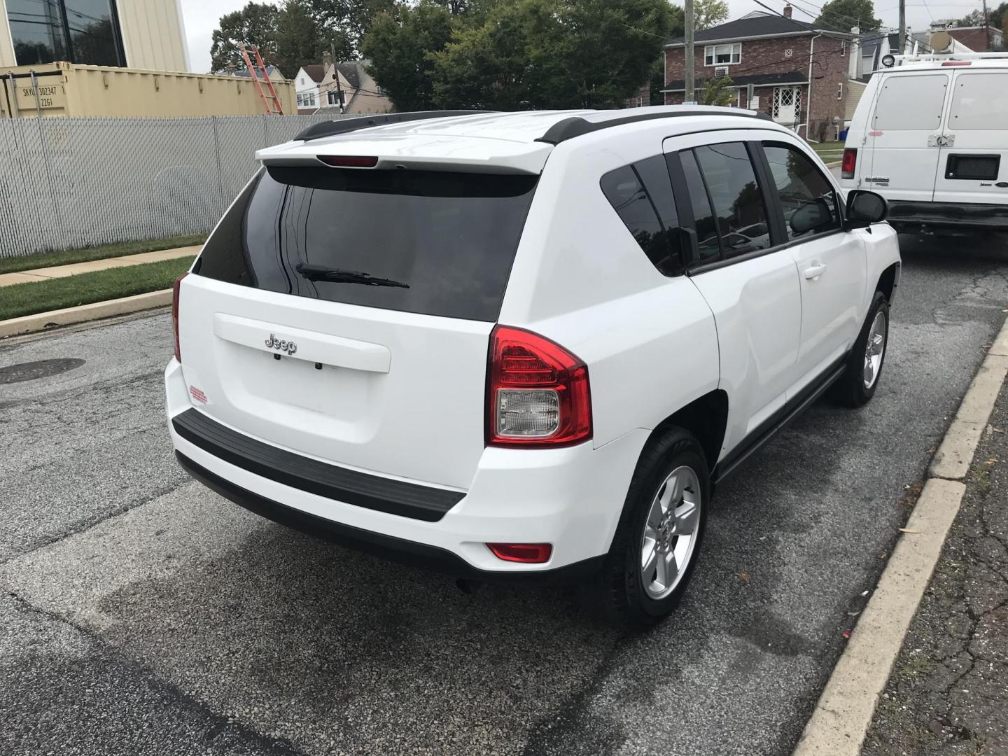 2013 White /Gray Jeep Compass Sport (1C4NJCBA4DD) with an 2.0L L4 DOHC 16V engine, Automatic transmission, located at 577 Chester Pike, Prospect Park, PA, 19076, (610) 237-1015, 39.886154, -75.302338 - 2013 Jeep Compass: Only 93k miles, great on gas, new PA inspection, SUPER CLEAN, runs LIKE NEW! This vehicle comes inspected and has been given a bumper to bumper safety check. It is very clean, reliable, and well maintained. We offer a unique pay plan that is known for being the easiest and fast - Photo#5