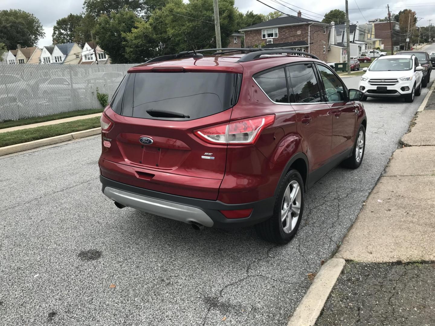 2013 Red /Tan Ford Escape SE AWD (1FMCU9GXXDU) with an 1.6L L4 DOHC 16V engine, 6-Speed Automatic transmission, located at 577 Chester Pike, Prospect Park, PA, 19076, (610) 237-1015, 39.886154, -75.302338 - 2013 Ford Escape SE: Only 110k miles, 4x4, new PA inspection, great on gas, runs LIKE NEW! This vehicle comes inspected and has been given a bumper to bumper safety check. It is very clean, reliable, and well maintained. We offer a unique pay plan that is known for being the easiest and fastest f - Photo#5