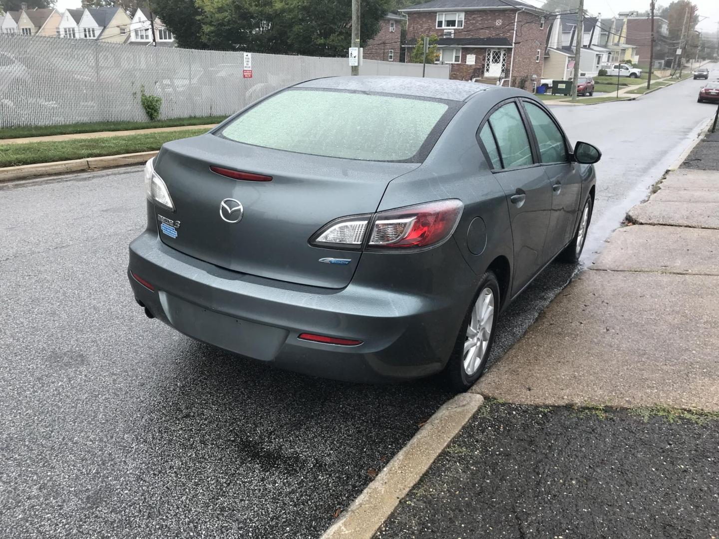 2012 Green /Gray Mazda MAZDA3 i Touring 4-Door (JM1BL1V87C1) with an 2.0L L4 DOHC 16V engine, Automatic transmission, located at 577 Chester Pike, Prospect Park, PA, 19076, (610) 237-1015, 39.886154, -75.302338 - 2012 Mazda 3 i Touring: Only 123k miles, great on gas, sunroof, new PA inspection, runs LIKE NEW! This vehicle comes inspected and has been given a bumper to bumper safety check. It is very clean, reliable, and well maintained. We offer a unique pay plan that is known for being the easiest and fa - Photo#4