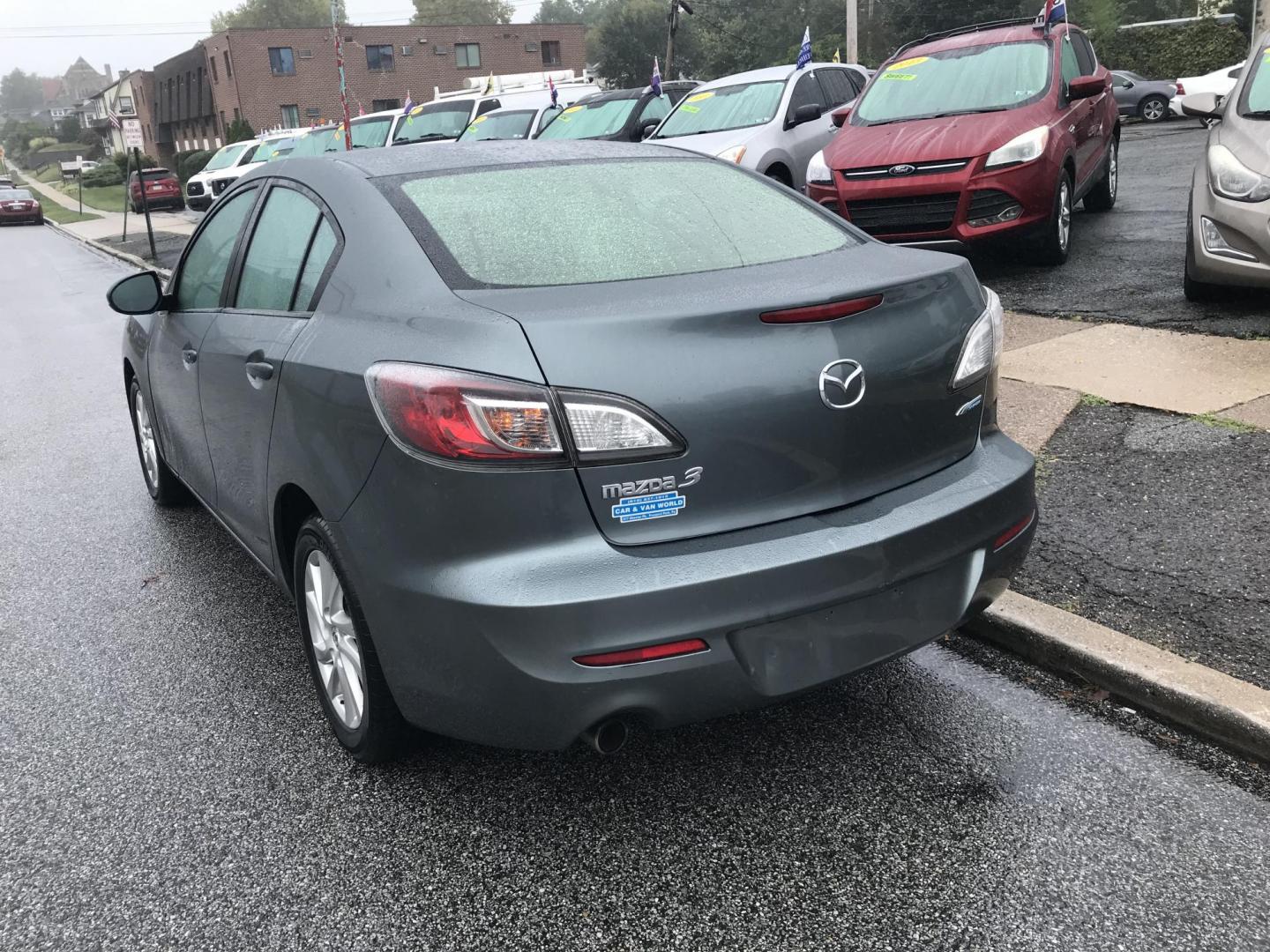 2012 Green /Gray Mazda MAZDA3 i Touring 4-Door (JM1BL1V87C1) with an 2.0L L4 DOHC 16V engine, Automatic transmission, located at 577 Chester Pike, Prospect Park, PA, 19076, (610) 237-1015, 39.886154, -75.302338 - 2012 Mazda 3 i Touring: Only 123k miles, great on gas, sunroof, new PA inspection, runs LIKE NEW! This vehicle comes inspected and has been given a bumper to bumper safety check. It is very clean, reliable, and well maintained. We offer a unique pay plan that is known for being the easiest and fa - Photo#5