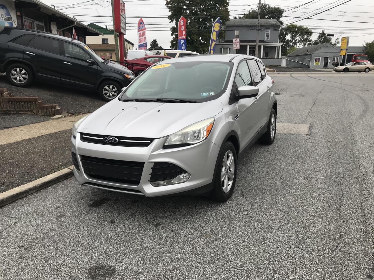 2016 Silver /Gray Ford Escape SE FWD (1FMCU0GX9GU) with an 1.6L L4 DOHC 16V engine, 6-Speed Automatic transmission, located at 577 Chester Pike, Prospect Park, PA, 19076, (610) 237-1015, 39.886154, -75.302338 - 2016 Ford Escape SE: Great on gas, new PA inspection, SUPER CLEAN, runs LIKE NEW! This vehicle comes inspected and has been given a bumper to bumper safety check. It is very clean, reliable, and well maintained. We offer a unique pay plan that is known for being the easiest and fastest financing - Photo#2