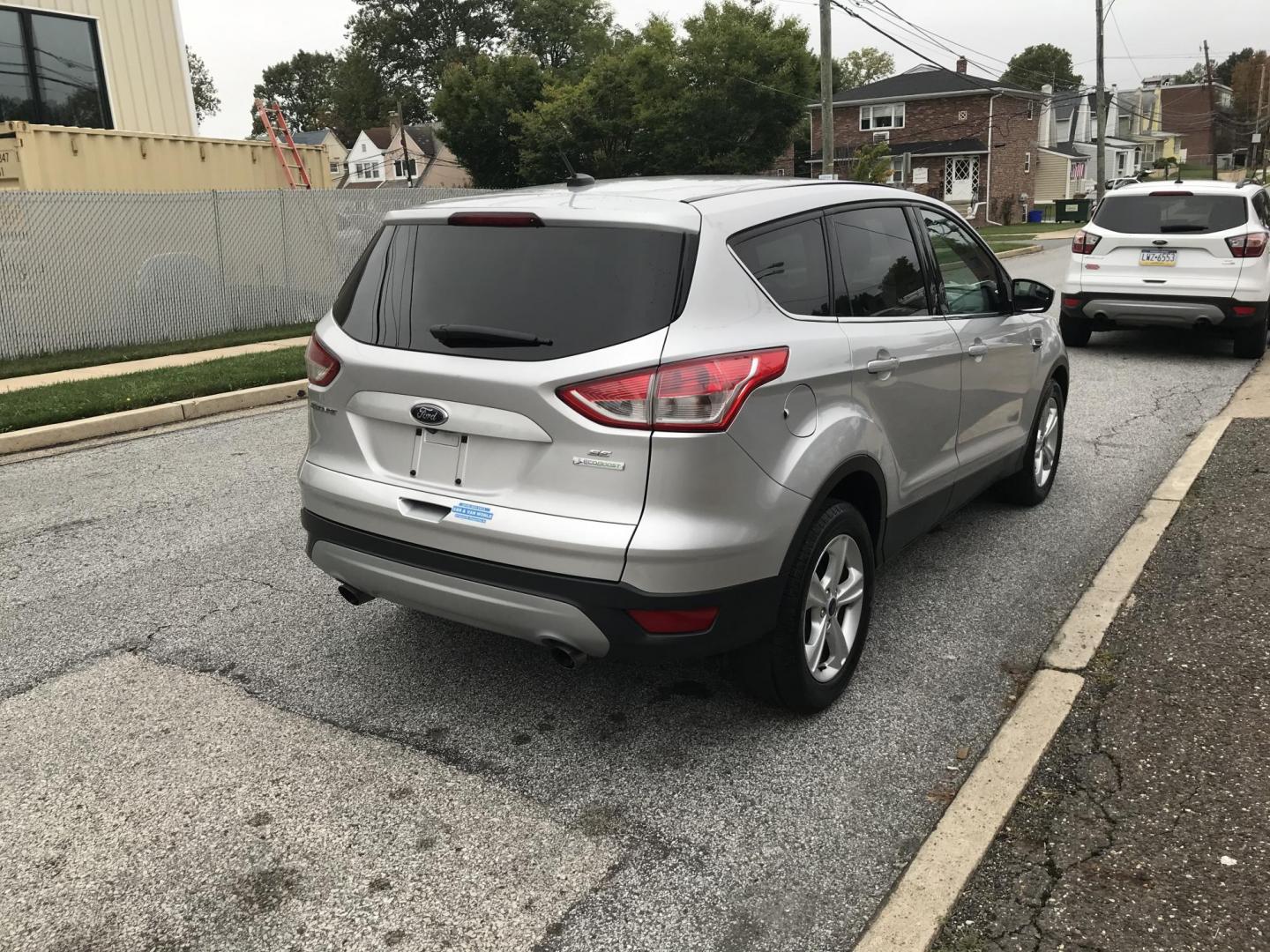 2016 Silver /Gray Ford Escape SE FWD (1FMCU0GX9GU) with an 1.6L L4 DOHC 16V engine, 6-Speed Automatic transmission, located at 577 Chester Pike, Prospect Park, PA, 19076, (610) 237-1015, 39.886154, -75.302338 - 2016 Ford Escape SE: Great on gas, new PA inspection, SUPER CLEAN, runs LIKE NEW! This vehicle comes inspected and has been given a bumper to bumper safety check. It is very clean, reliable, and well maintained. We offer a unique pay plan that is known for being the easiest and fastest financing - Photo#3