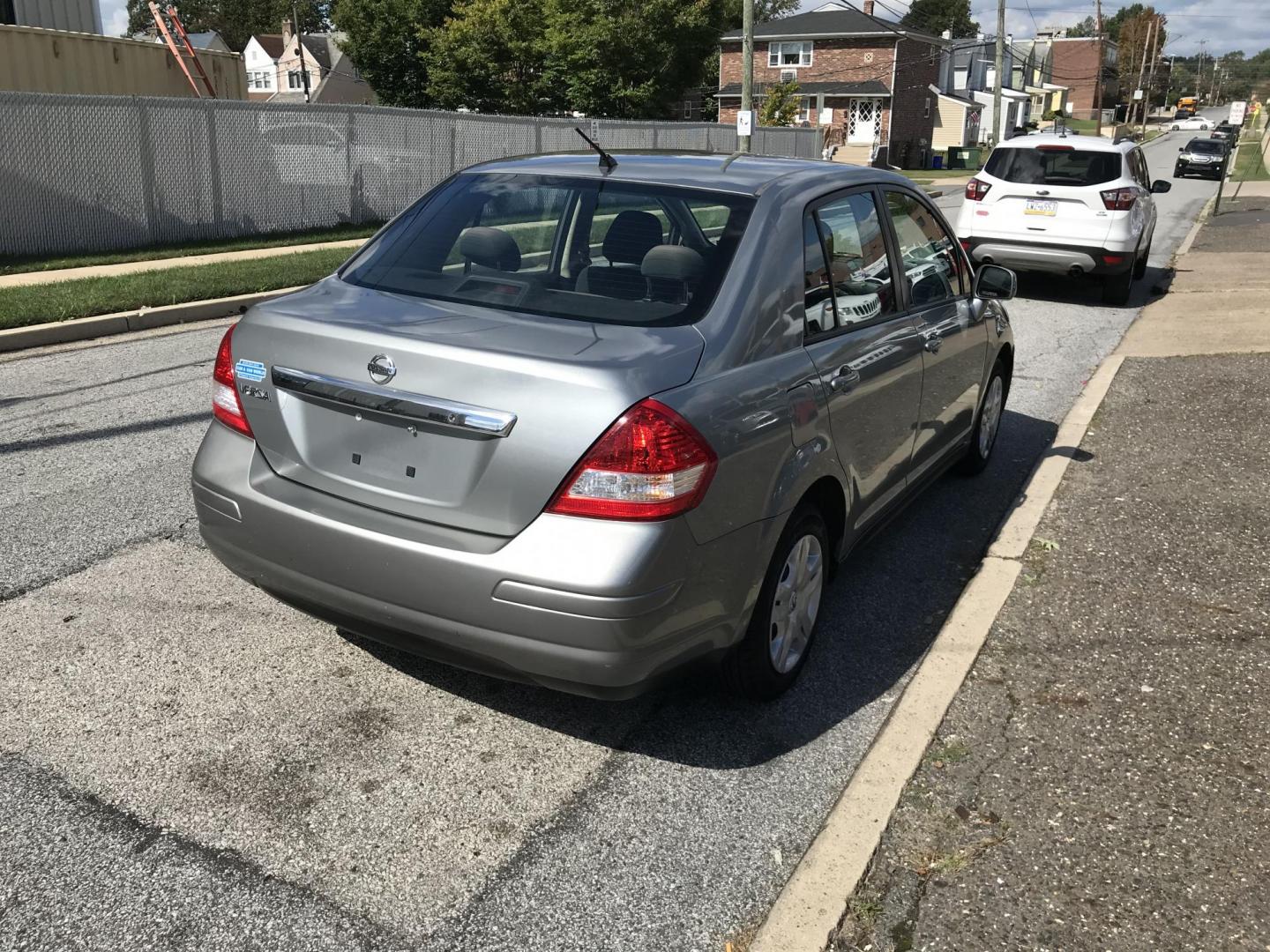 2011 Silver /Gray Nissan Versa 1.8 S Sedan (3N1BC1AP0BL) with an 1.8L L4 DOHC 16V engine, 4-Speed Aut transmission, located at 577 Chester Pike, Prospect Park, PA, 19076, (610) 237-1015, 39.886154, -75.302338 - 2011 Nissan Versa S: Only 122k miles, great on gas, new PA inspection, runs LIKE NEW! This vehicle comes inspected and has been given a bumper to bumper safety check. It is very clean, reliable, and well maintained. We offer a unique pay plan that is known for being the easiest and fastest financ - Photo#4