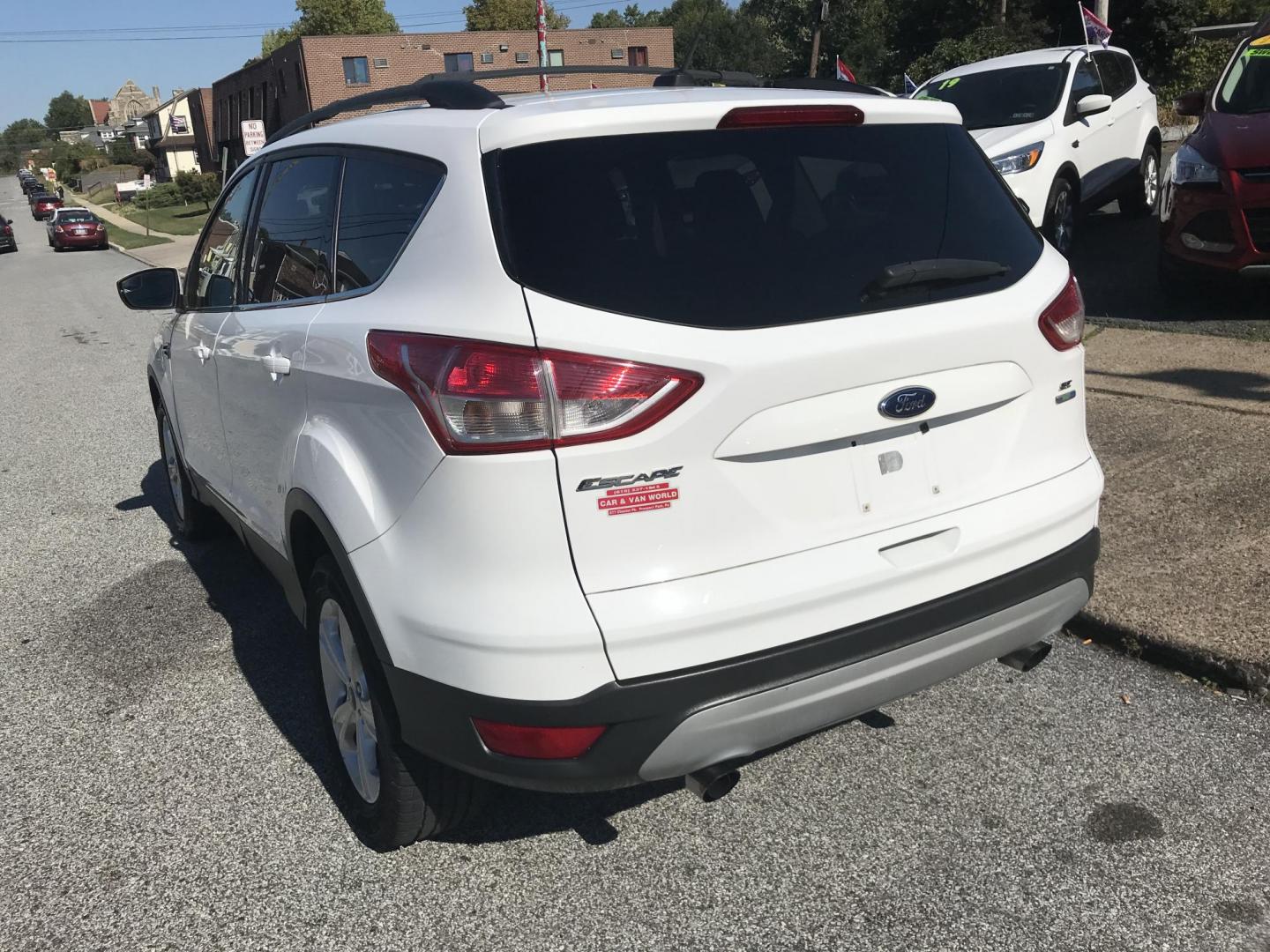 2013 White /Gray Ford Escape SE AWD (1FMCU9GX0DU) with an 1.6L L4 DOHC 16V engine, 6-Speed Automatic transmission, located at 577 Chester Pike, Prospect Park, PA, 19076, (610) 237-1015, 39.886154, -75.302338 - 2013 Ford Escape SE: All wheel drive, great on gas, new PA inspection, SUPER CLEAN! This vehicle comes inspected and has been given a bumper to bumper safety check. It is very clean, reliable, and well maintained. We offer a unique pay plan that is known for being the easiest and fastest financin - Photo#4