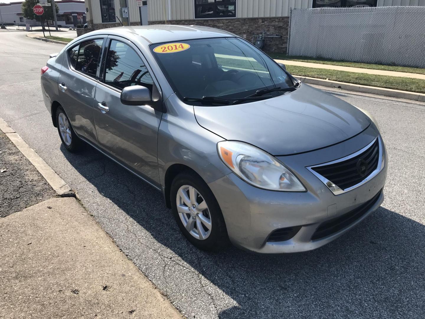 2014 Gray /Gray Nissan Versa 1.6 S 5M (3N1CN7AP0EL) with an 1.6L L4 DOHC 16V engine, Automatic transmission, located at 577 Chester Pike, Prospect Park, PA, 19076, (610) 237-1015, 39.886154, -75.302338 - 2014 Nissan Versa: Only 97k miles, new PA inspection, great on gas, runs LIKE NEW! This vehicle comes inspected and has been given a bumper to bumper safety check. It is very clean, reliable, and well maintained. We offer a unique pay plan that is known for being the easiest and fastest financing - Photo#2