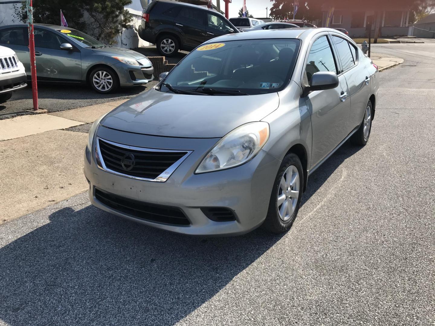 2014 Gray /Gray Nissan Versa 1.6 S 5M (3N1CN7AP0EL) with an 1.6L L4 DOHC 16V engine, Automatic transmission, located at 577 Chester Pike, Prospect Park, PA, 19076, (610) 237-1015, 39.886154, -75.302338 - 2014 Nissan Versa: Only 97k miles, new PA inspection, great on gas, runs LIKE NEW! This vehicle comes inspected and has been given a bumper to bumper safety check. It is very clean, reliable, and well maintained. We offer a unique pay plan that is known for being the easiest and fastest financing - Photo#3