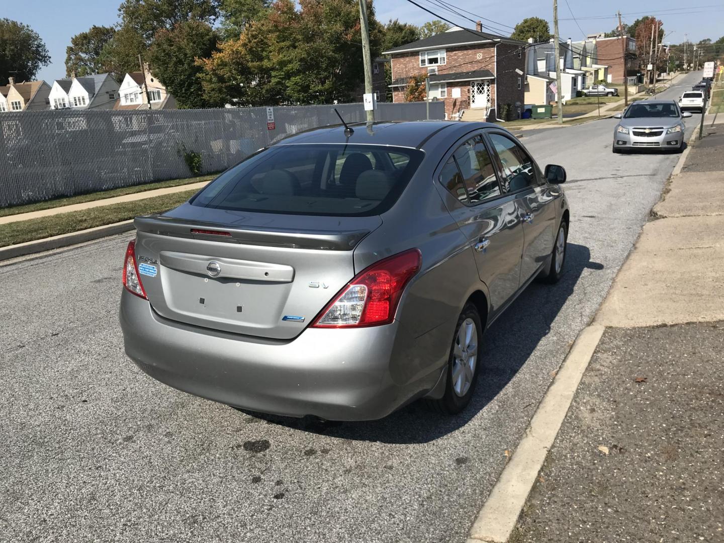 2014 Gray /Gray Nissan Versa 1.6 S 5M (3N1CN7AP0EL) with an 1.6L L4 DOHC 16V engine, Automatic transmission, located at 577 Chester Pike, Prospect Park, PA, 19076, (610) 237-1015, 39.886154, -75.302338 - 2014 Nissan Versa: Only 97k miles, new PA inspection, great on gas, runs LIKE NEW! This vehicle comes inspected and has been given a bumper to bumper safety check. It is very clean, reliable, and well maintained. We offer a unique pay plan that is known for being the easiest and fastest financing - Photo#4