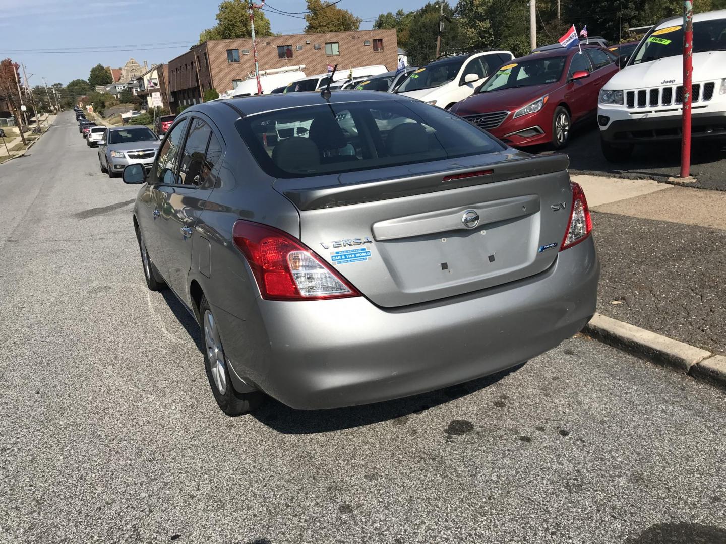 2014 Gray /Gray Nissan Versa 1.6 S 5M (3N1CN7AP0EL) with an 1.6L L4 DOHC 16V engine, Automatic transmission, located at 577 Chester Pike, Prospect Park, PA, 19076, (610) 237-1015, 39.886154, -75.302338 - 2014 Nissan Versa: Only 97k miles, new PA inspection, great on gas, runs LIKE NEW! This vehicle comes inspected and has been given a bumper to bumper safety check. It is very clean, reliable, and well maintained. We offer a unique pay plan that is known for being the easiest and fastest financing - Photo#5