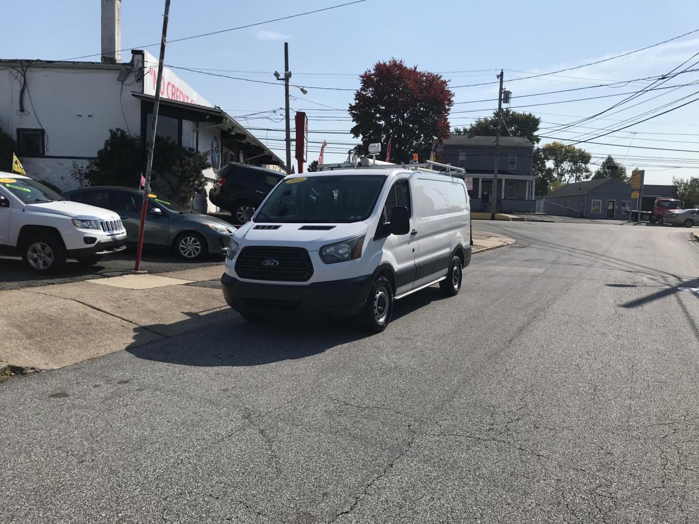 2015 White /Gray Ford Transit 150 Van Low Roof w/Sliding Pass. 130-in. WB (1FTNE1YM8FK) with an 3.7L V6 DOHC 24V engine, 6-Speed Automatic transmission, located at 577 Chester Pike, Prospect Park, PA, 19076, (610) 237-1015, 39.886154, -75.302338 - 2015 Ford Transit 150 Low Roof: Only 134k miles, drop down ladder racks, shelving, partition, new PA inspection, FLEET MAINTAINED, runs LIKE NEW! This vehicle comes inspected and has been given a bumper to bumper safety check. It is very clean, reliable, and well maintained. We offer a unique pay - Photo#2