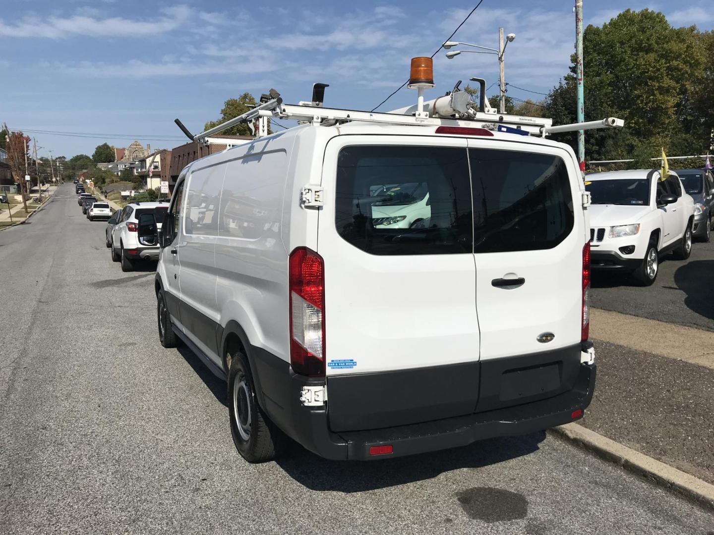 2015 White /Gray Ford Transit 150 Van Low Roof w/Sliding Pass. 130-in. WB (1FTNE1YM8FK) with an 3.7L V6 DOHC 24V engine, 6-Speed Automatic transmission, located at 577 Chester Pike, Prospect Park, PA, 19076, (610) 237-1015, 39.886154, -75.302338 - 2015 Ford Transit 150 Low Roof: Only 134k miles, drop down ladder racks, shelving, partition, new PA inspection, FLEET MAINTAINED, runs LIKE NEW! This vehicle comes inspected and has been given a bumper to bumper safety check. It is very clean, reliable, and well maintained. We offer a unique pay - Photo#4