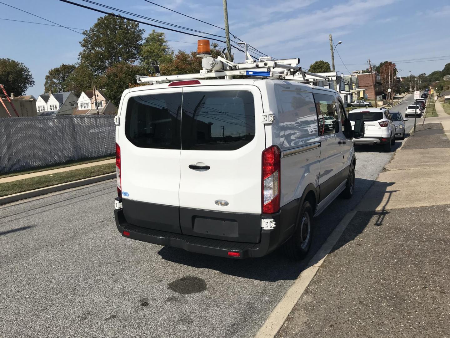 2015 White /Gray Ford Transit 150 Van Low Roof w/Sliding Pass. 130-in. WB (1FTNE1YM8FK) with an 3.7L V6 DOHC 24V engine, 6-Speed Automatic transmission, located at 577 Chester Pike, Prospect Park, PA, 19076, (610) 237-1015, 39.886154, -75.302338 - 2015 Ford Transit 150 Low Roof: Only 134k miles, drop down ladder racks, shelving, partition, new PA inspection, FLEET MAINTAINED, runs LIKE NEW! This vehicle comes inspected and has been given a bumper to bumper safety check. It is very clean, reliable, and well maintained. We offer a unique pay - Photo#5