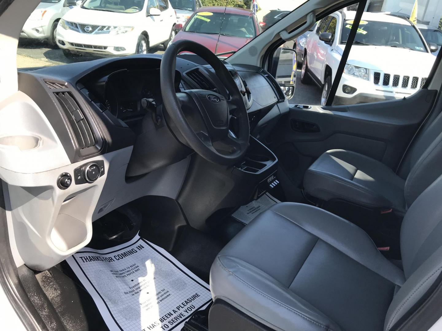 2015 White /Gray Ford Transit 150 Van Low Roof w/Sliding Pass. 130-in. WB (1FTNE1YM8FK) with an 3.7L V6 DOHC 24V engine, 6-Speed Automatic transmission, located at 577 Chester Pike, Prospect Park, PA, 19076, (610) 237-1015, 39.886154, -75.302338 - 2015 Ford Transit 150 Low Roof: Only 134k miles, drop down ladder racks, shelving, partition, new PA inspection, FLEET MAINTAINED, runs LIKE NEW! This vehicle comes inspected and has been given a bumper to bumper safety check. It is very clean, reliable, and well maintained. We offer a unique pay - Photo#7