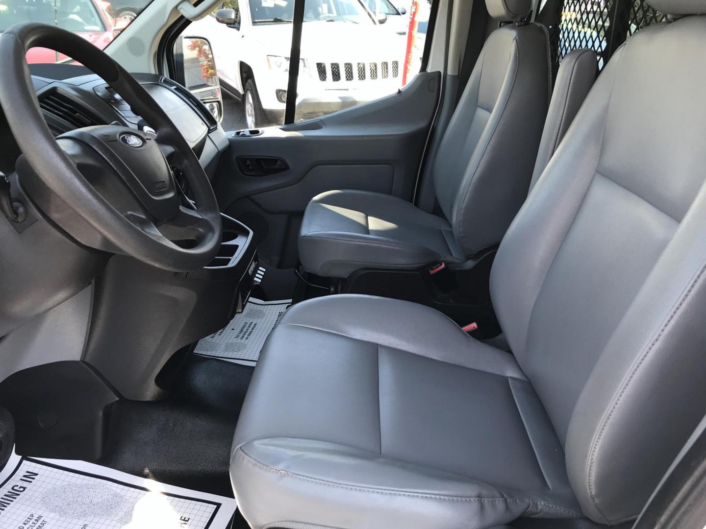 2015 White /Gray Ford Transit 150 Van Low Roof w/Sliding Pass. 130-in. WB (1FTNE1YM8FK) with an 3.7L V6 DOHC 24V engine, 6-Speed Automatic transmission, located at 577 Chester Pike, Prospect Park, PA, 19076, (610) 237-1015, 39.886154, -75.302338 - 2015 Ford Transit 150 Low Roof: Only 134k miles, drop down ladder racks, shelving, partition, new PA inspection, FLEET MAINTAINED, runs LIKE NEW! This vehicle comes inspected and has been given a bumper to bumper safety check. It is very clean, reliable, and well maintained. We offer a unique pay - Photo#9