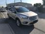 2018 Gold /Gray Ford Escape SE 4WD (1FMCU9GD5JU) with an 1.5L L4 DOHC 16V engine, 6A transmission, located at 577 Chester Pike, Prospect Park, PA, 19076, (610) 237-1015, 39.886154, -75.302338 - Photo#2