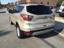 2018 Gold /Gray Ford Escape SE 4WD (1FMCU9GD5JU) with an 1.5L L4 DOHC 16V engine, 6A transmission, located at 577 Chester Pike, Prospect Park, PA, 19076, (610) 237-1015, 39.886154, -75.302338 - 2018 Ford Escape SE: 4x4, new PA inspection, backup camera, great on gas, runs LIKE NEW! This vehicle comes inspected and has been given a bumper to bumper safety check. It is very clean, reliable, and well maintained. We offer a unique pay plan that is known for being the easiest and fastest fin - Photo#4