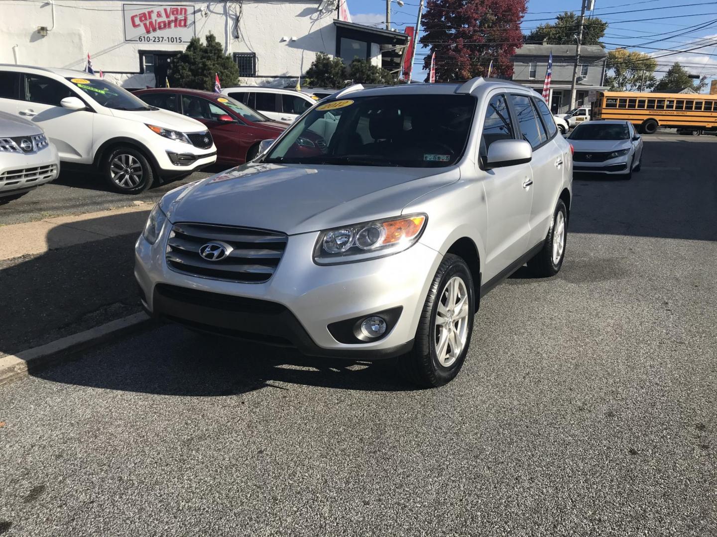 2012 Silver /Gray Hyundai Santa Fe Limited 3.5 FWD (5XYZK4AG2CG) with an 3.5L V6 DOHC 24V engine, 6-Speed Automatic transmission, located at 577 Chester Pike, Prospect Park, PA, 19076, (610) 237-1015, 39.886154, -75.302338 - Photo#2