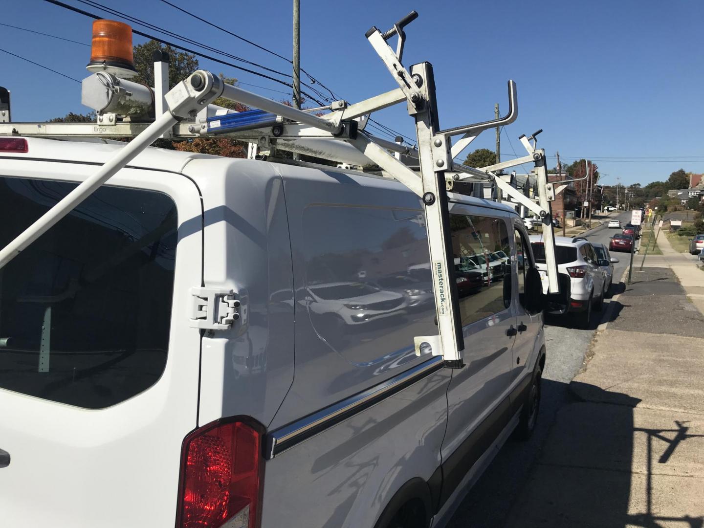 2015 White /Gray Ford Transit 150 Van Low Roof w/Sliding Pass. 130-in. WB (1FTNE1YM2FK) with an 3.7L V6 DOHC 24V engine, 6-Speed Automatic transmission, located at 577 Chester Pike, Prospect Park, PA, 19076, (610) 237-1015, 39.886154, -75.302338 - 2015 Ford Transit 150 Low Roof: Only 131k miles, drop down ladder racks, shelving, partition, new PA inspection, FLEET MAINTAINED, runs LIKE NEW! This vehicle comes inspected and has been given a bumper to bumper safety check. It is very clean, reliable, and well maintained. We offer a unique pay - Photo#14