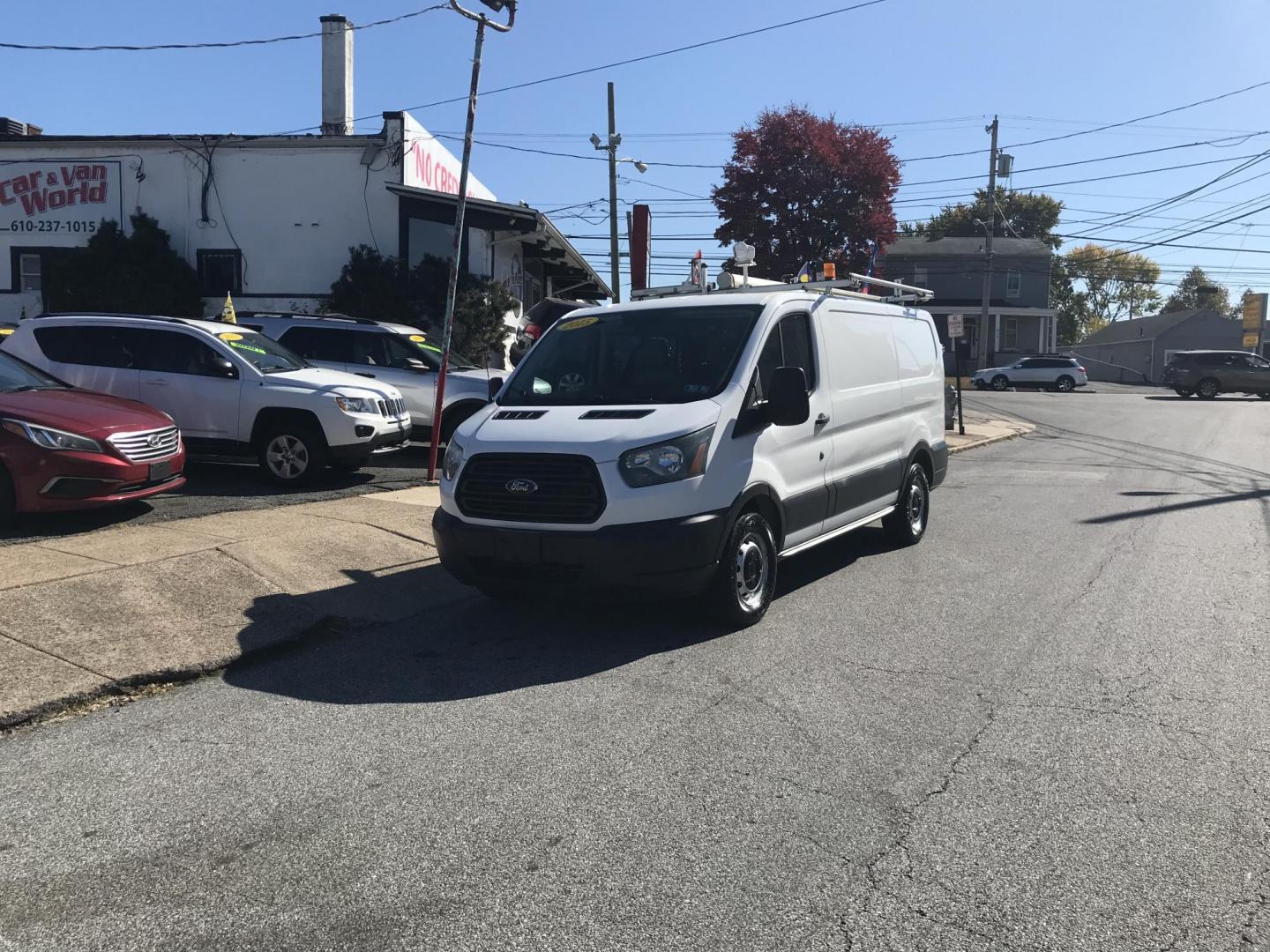 2015 White /Gray Ford Transit 150 Van Low Roof w/Sliding Pass. 130-in. WB (1FTNE1YM2FK) with an 3.7L V6 DOHC 24V engine, 6-Speed Automatic transmission, located at 577 Chester Pike, Prospect Park, PA, 19076, (610) 237-1015, 39.886154, -75.302338 - Photo#2