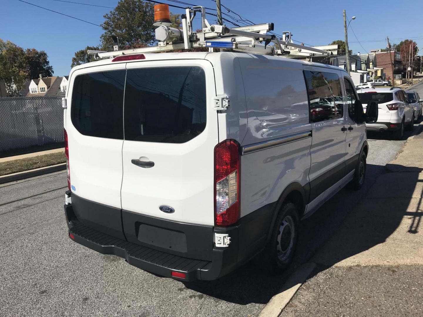 2015 White /Gray Ford Transit 150 Van Low Roof w/Sliding Pass. 130-in. WB (1FTNE1YM2FK) with an 3.7L V6 DOHC 24V engine, 6-Speed Automatic transmission, located at 577 Chester Pike, Prospect Park, PA, 19076, (610) 237-1015, 39.886154, -75.302338 - 2015 Ford Transit 150 Low Roof: Only 131k miles, drop down ladder racks, shelving, partition, new PA inspection, FLEET MAINTAINED, runs LIKE NEW! This vehicle comes inspected and has been given a bumper to bumper safety check. It is very clean, reliable, and well maintained. We offer a unique pay - Photo#4