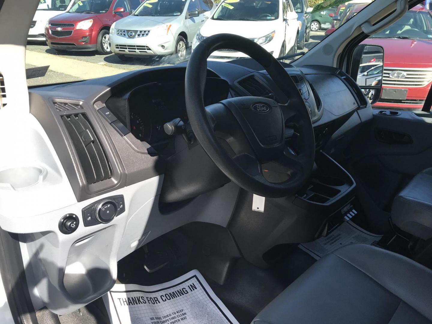 2015 White /Gray Ford Transit 150 Van Low Roof w/Sliding Pass. 130-in. WB (1FTNE1YM2FK) with an 3.7L V6 DOHC 24V engine, 6-Speed Automatic transmission, located at 577 Chester Pike, Prospect Park, PA, 19076, (610) 237-1015, 39.886154, -75.302338 - 2015 Ford Transit 150 Low Roof: Only 131k miles, drop down ladder racks, shelving, partition, new PA inspection, FLEET MAINTAINED, runs LIKE NEW! This vehicle comes inspected and has been given a bumper to bumper safety check. It is very clean, reliable, and well maintained. We offer a unique pay - Photo#8