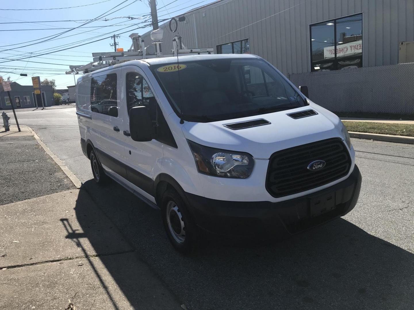 2016 White /Gray Ford Transit 150 Van Low Roof w/Sliding Pass. 130-in. WB (1FTYE1YM0GK) with an 3.7L V6 DOHC 24V engine, 6A transmission, located at 577 Chester Pike, Prospect Park, PA, 19076, (610) 237-1015, 39.886154, -75.302338 - 2016 Ford Transit 150 Low Roof: Only 138k miles, drop down ladder racks both sides, multiple pieces of shelving, backup camera, FLEET MAINTAINED, runs LIKE NEW! This vehicle comes inspected and has been given a bumper to bumper safety check. It is very clean, reliable, and well maintained. We off - Photo#3