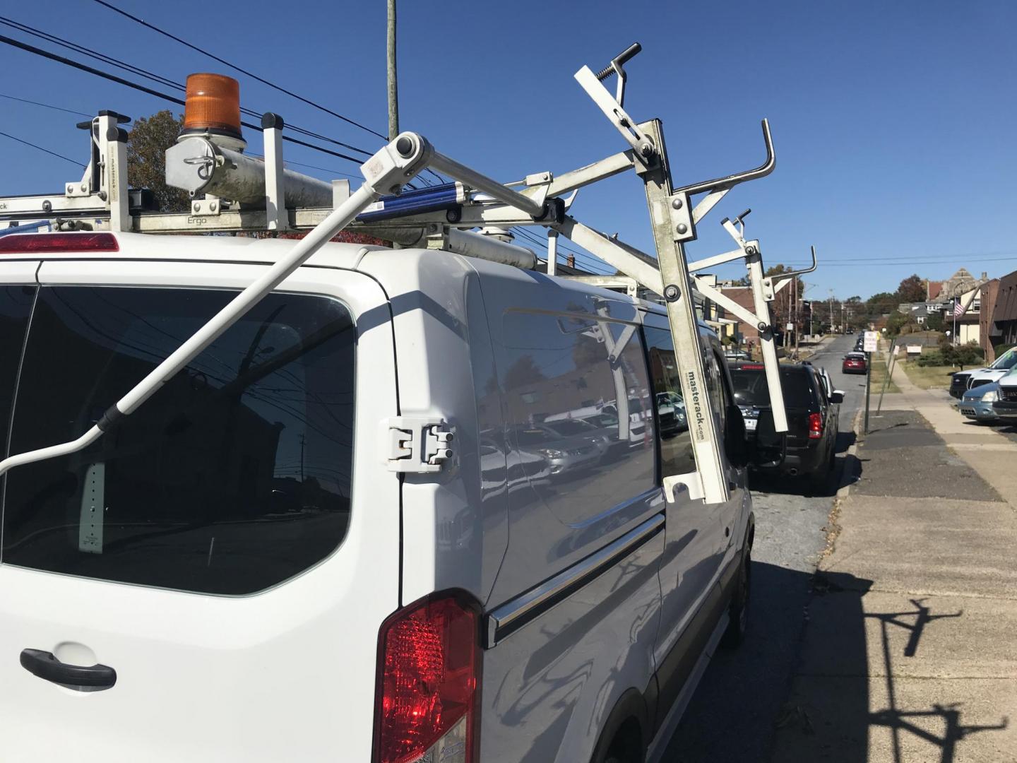 2016 White /Gray Ford Transit 150 Van Low Roof w/Sliding Pass. 130-in. WB (1FTYE1YM0GK) with an 3.7L V6 DOHC 24V engine, 6A transmission, located at 577 Chester Pike, Prospect Park, PA, 19076, (610) 237-1015, 39.886154, -75.302338 - 2016 Ford Transit 150 Low Roof: Only 138k miles, drop down ladder racks both sides, multiple pieces of shelving, backup camera, FLEET MAINTAINED, runs LIKE NEW! This vehicle comes inspected and has been given a bumper to bumper safety check. It is very clean, reliable, and well maintained. We off - Photo#5