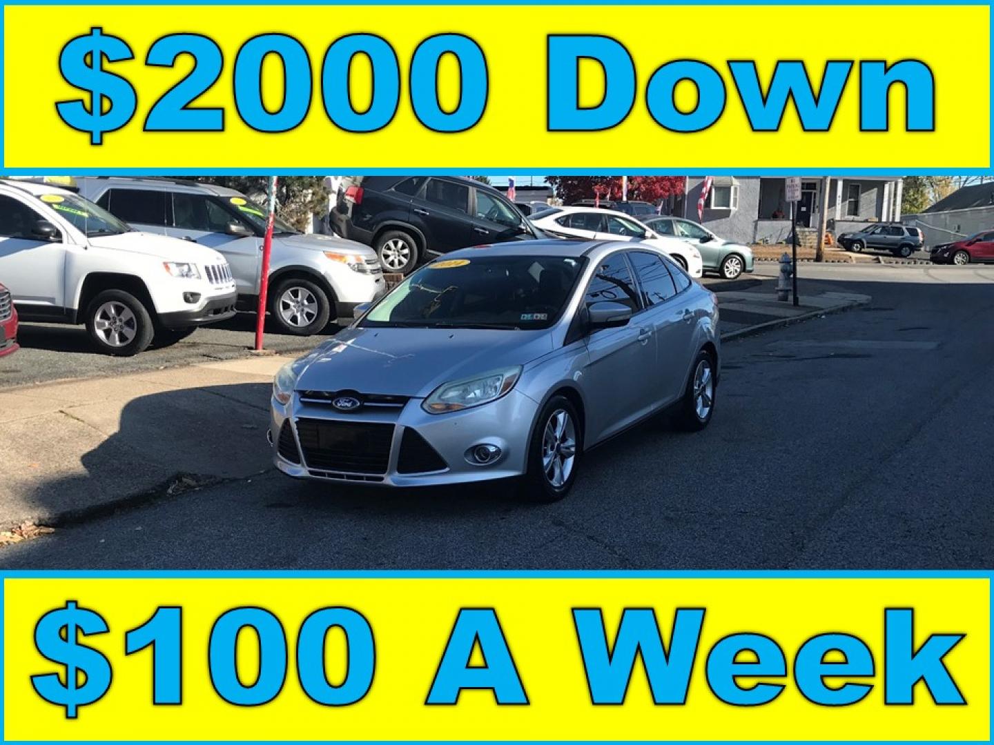 2014 Silver /Gray Ford Focus SE Sedan (1FADP3F29EL) with an 2.0L L4 DOHC 16V engine, Automatic transmission, located at 577 Chester Pike, Prospect Park, PA, 19076, (610) 237-1015, 39.886154, -75.302338 - Photo#0