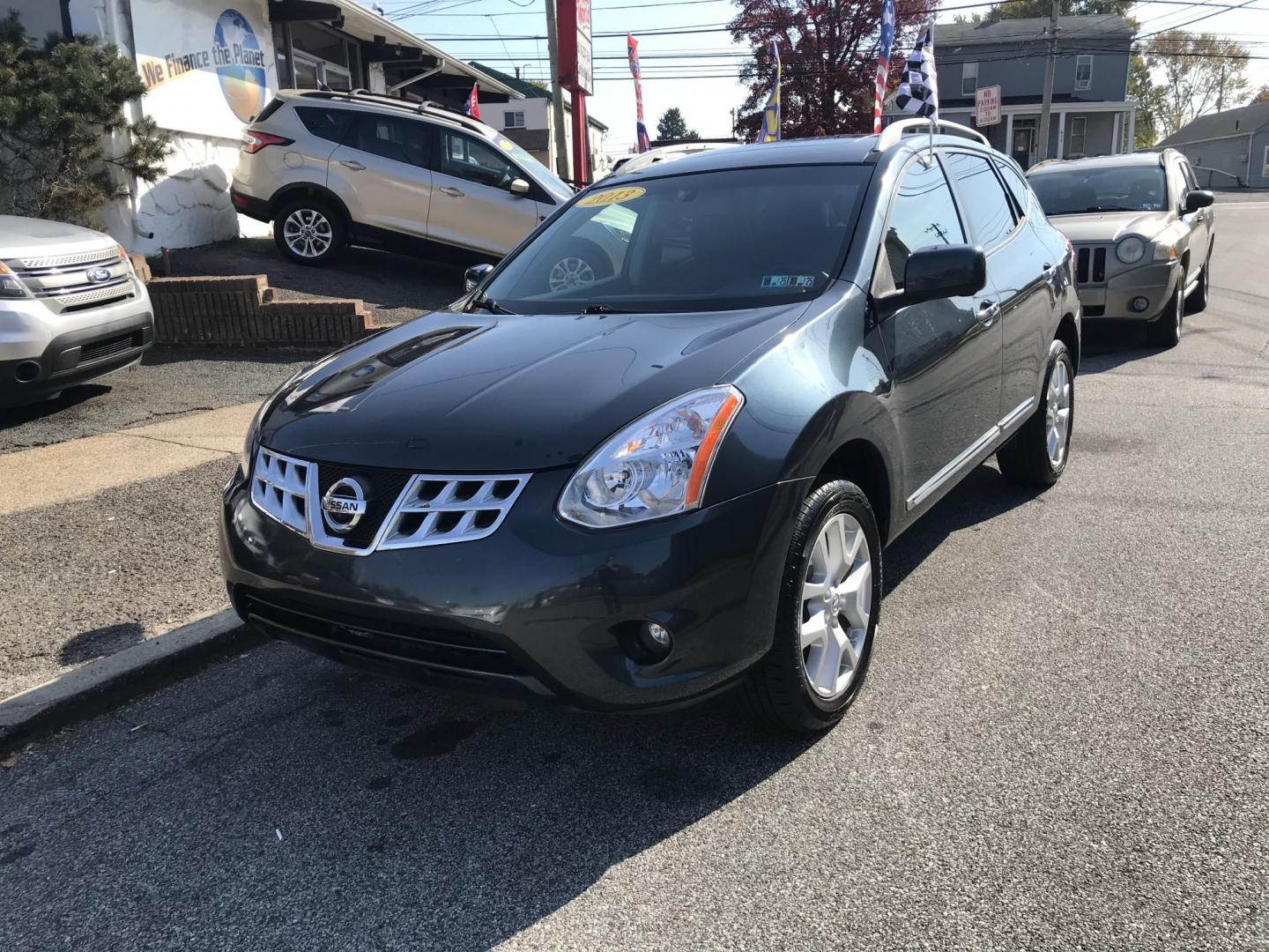 2013 Blue /Black Nissan Rogue SL AWD (JN8AS5MV3DW) with an 2.5L L4 DOHC 16V engine, Continuously Variable Transmission transmission, located at 577 Chester Pike, Prospect Park, PA, 19076, (610) 237-1015, 39.886154, -75.302338 - Photo#1