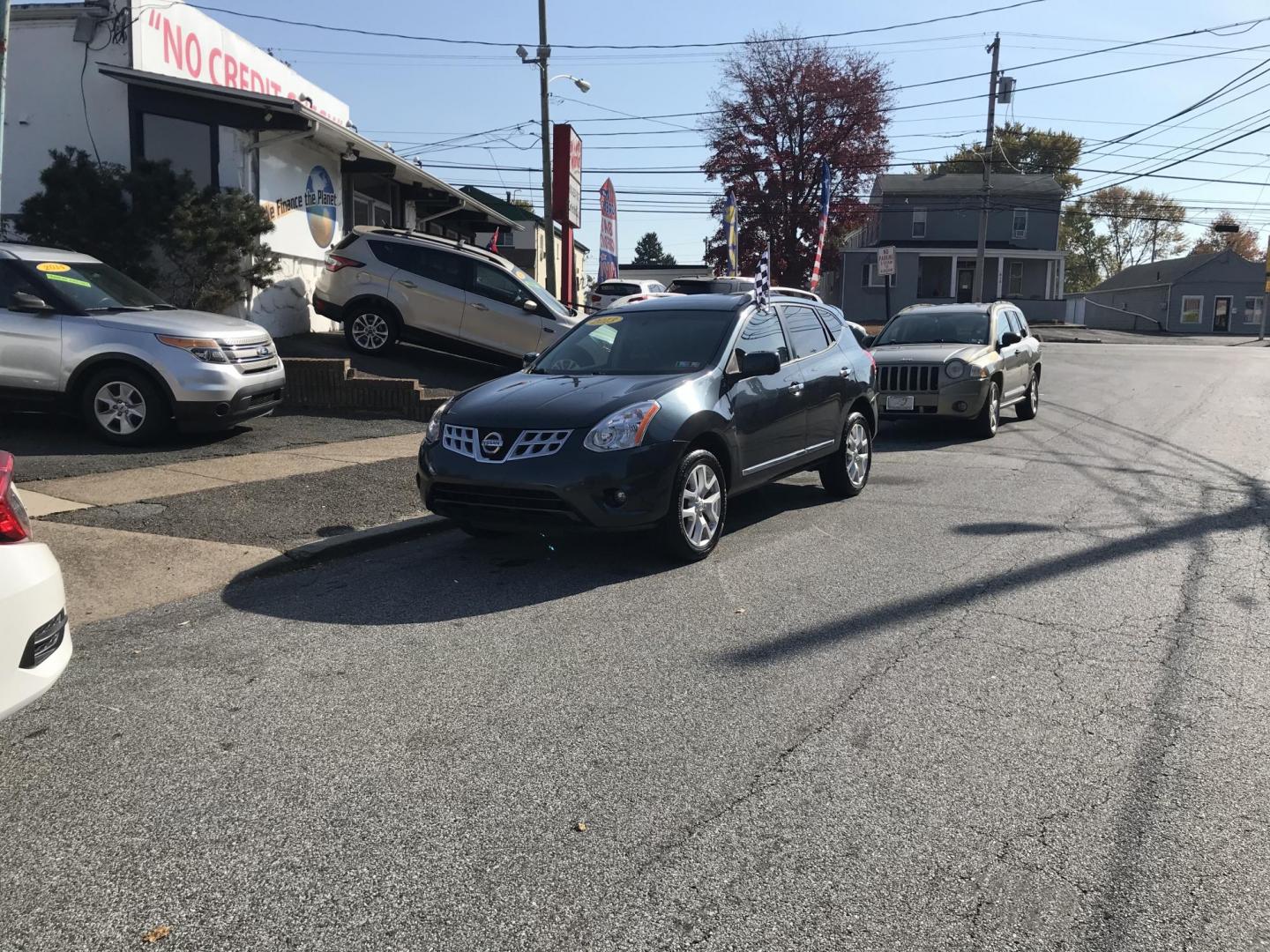 2013 Blue /Black Nissan Rogue SL AWD (JN8AS5MV3DW) with an 2.5L L4 DOHC 16V engine, Continuously Variable Transmission transmission, located at 577 Chester Pike, Prospect Park, PA, 19076, (610) 237-1015, 39.886154, -75.302338 - Photo#2