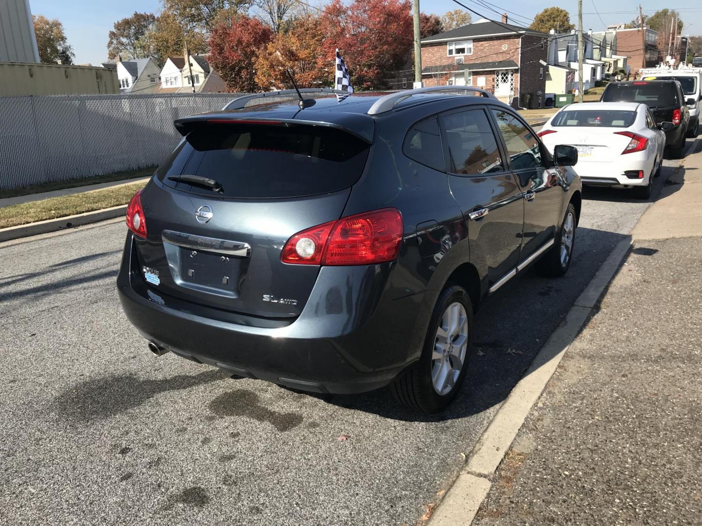 2013 Blue /Black Nissan Rogue SL AWD (JN8AS5MV3DW) with an 2.5L L4 DOHC 16V engine, Continuously Variable Transmission transmission, located at 577 Chester Pike, Prospect Park, PA, 19076, (610) 237-1015, 39.886154, -75.302338 - Photo#4