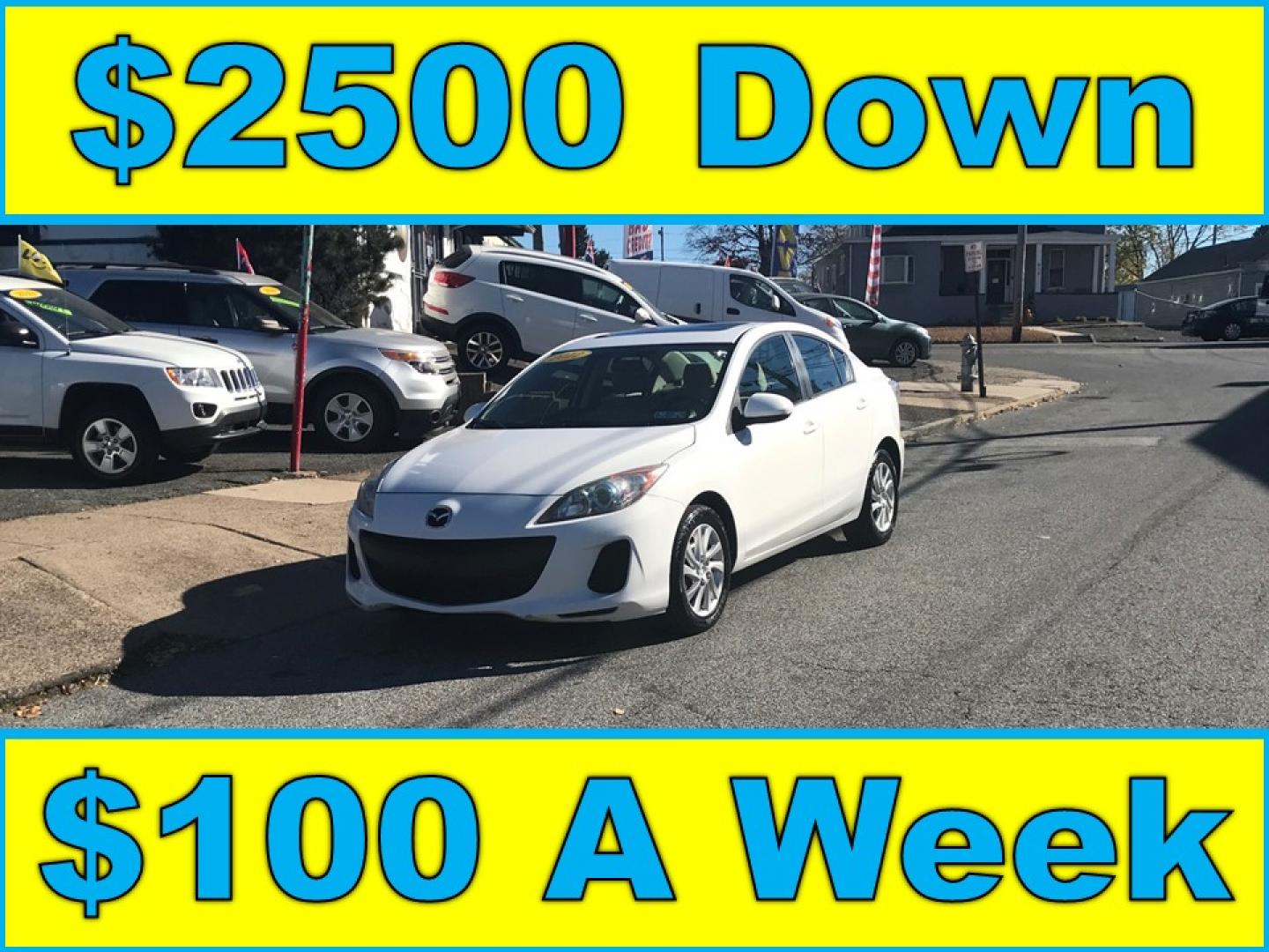 2012 White /Gray Mazda MAZDA3 i Touring 4-Door (JM1BL1V88C1) with an 2.0L L4 DOHC 16V engine, Automatic transmission, located at 577 Chester Pike, Prospect Park, PA, 19076, (610) 237-1015, 39.886154, -75.302338 - Photo#0