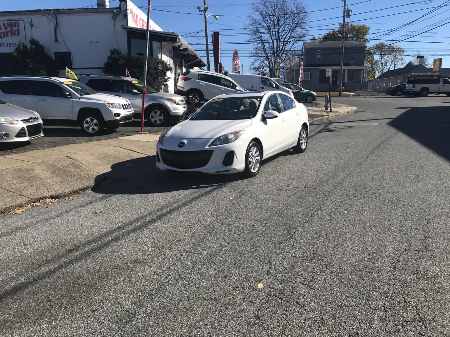 2012 White /Gray Mazda MAZDA3 i Touring 4-Door (JM1BL1V88C1) with an 2.0L L4 DOHC 16V engine, Automatic transmission, located at 577 Chester Pike, Prospect Park, PA, 19076, (610) 237-1015, 39.886154, -75.302338 - Photo#1