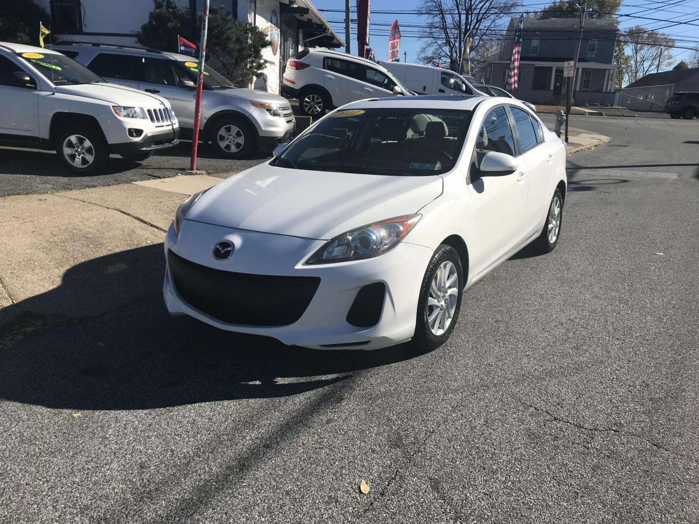 2012 White /Gray Mazda MAZDA3 i Touring 4-Door (JM1BL1V88C1) with an 2.0L L4 DOHC 16V engine, Automatic transmission, located at 577 Chester Pike, Prospect Park, PA, 19076, (610) 237-1015, 39.886154, -75.302338 - Photo#2