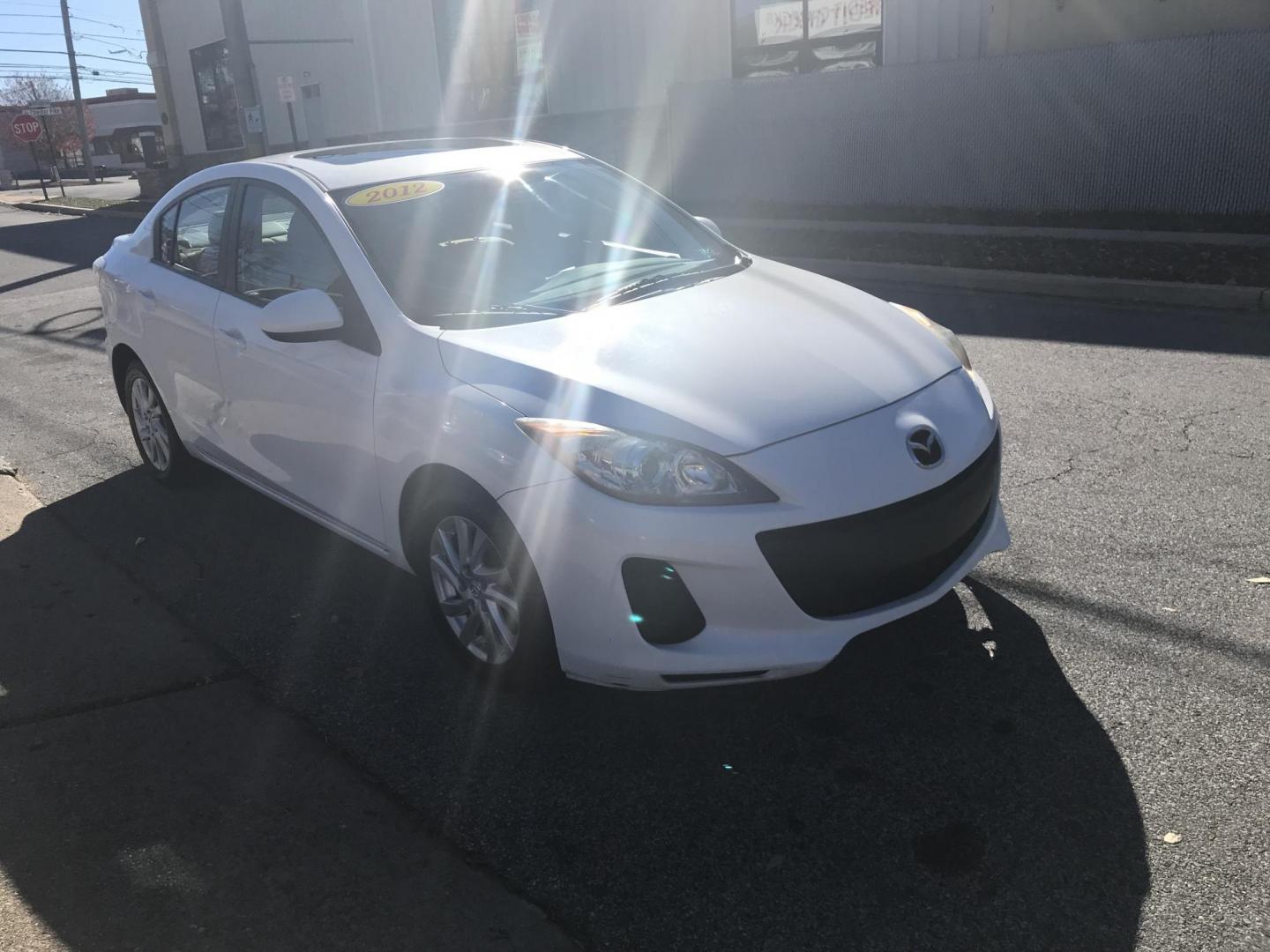 2012 White /Gray Mazda MAZDA3 i Touring 4-Door (JM1BL1V88C1) with an 2.0L L4 DOHC 16V engine, Automatic transmission, located at 577 Chester Pike, Prospect Park, PA, 19076, (610) 237-1015, 39.886154, -75.302338 - Photo#3