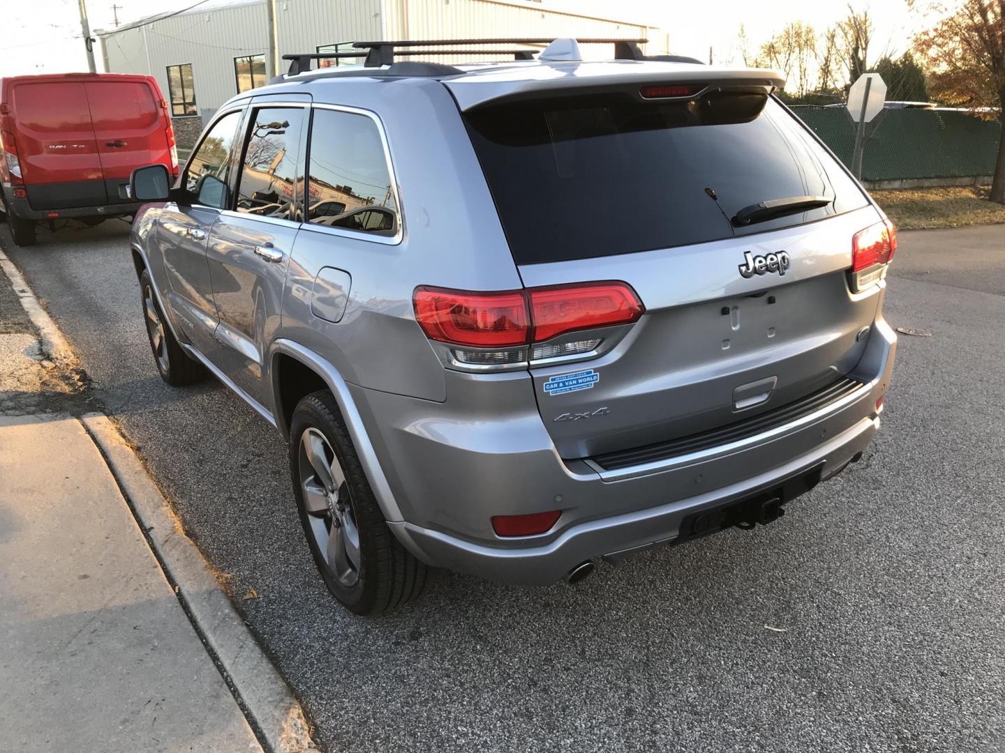 2015 Silver /Black Jeep Grand Cherokee Overland 4WD (1C4RJFCT3FC) with an 5.7L V8 OHV 16V engine, 8-Speed Automatic transmission, located at 577 Chester Pike, Prospect Park, PA, 19076, (610) 237-1015, 39.886154, -75.302338 - Photo#6