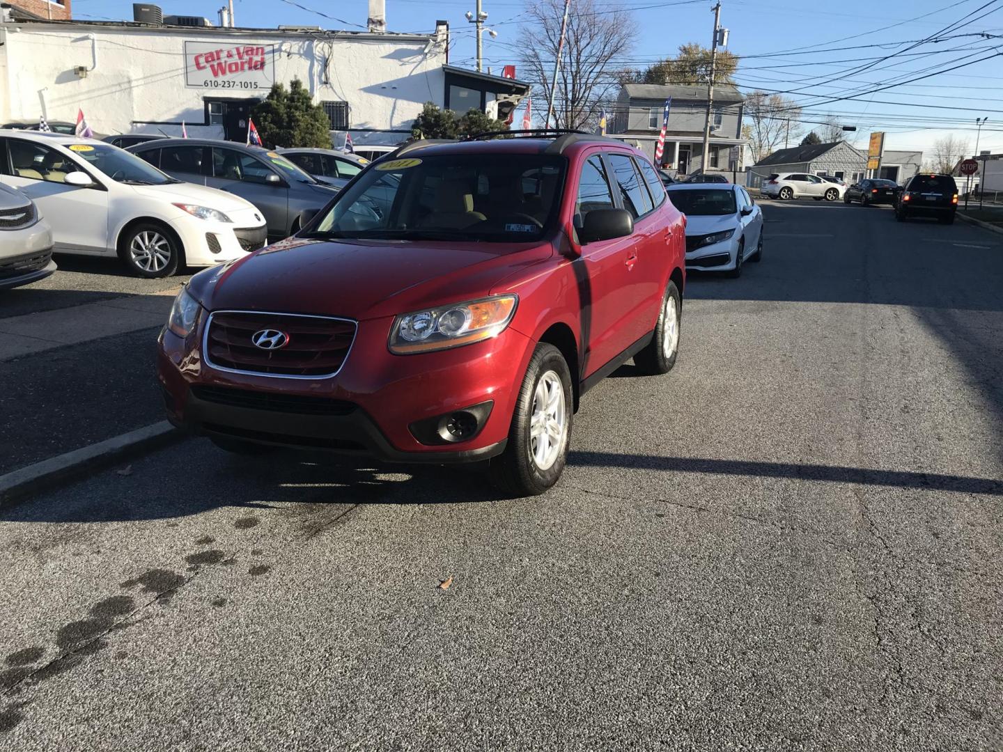 2011 Red /Tan Hyundai Santa Fe GLS 2.4 (5XYZG3AB8BG) with an 2.4L L4 DOHC 16V engine, 6-Speed Automatic transmission, located at 577 Chester Pike, Prospect Park, PA, 19076, (610) 237-1015, 39.886154, -75.302338 - 2011 Hyundai Santa Fe GL: Only 94k miles, new PA inspection, great on gas, runs LIKE NEW! This vehicle comes inspected and has been given a bumper to bumper safety check. It is very clean, reliable, and well maintained. We offer a unique pay plan that is known for being the easiest and fastest fi - Photo#1