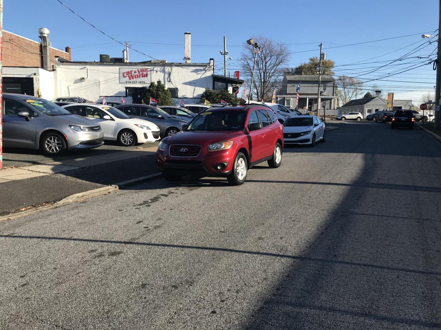 2011 Red /Tan Hyundai Santa Fe GLS 2.4 (5XYZG3AB8BG) with an 2.4L L4 DOHC 16V engine, 6-Speed Automatic transmission, located at 577 Chester Pike, Prospect Park, PA, 19076, (610) 237-1015, 39.886154, -75.302338 - 2011 Hyundai Santa Fe GL: Only 94k miles, new PA inspection, great on gas, runs LIKE NEW! This vehicle comes inspected and has been given a bumper to bumper safety check. It is very clean, reliable, and well maintained. We offer a unique pay plan that is known for being the easiest and fastest fi - Photo#2