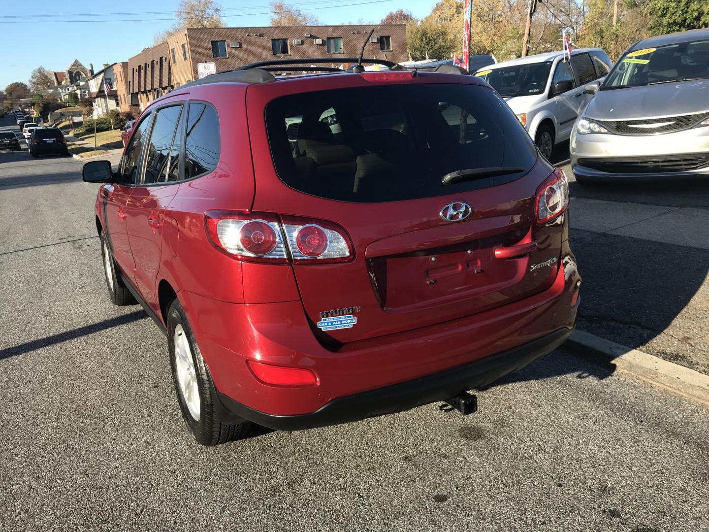 2011 Red /Tan Hyundai Santa Fe GLS 2.4 (5XYZG3AB8BG) with an 2.4L L4 DOHC 16V engine, 6-Speed Automatic transmission, located at 577 Chester Pike, Prospect Park, PA, 19076, (610) 237-1015, 39.886154, -75.302338 - 2011 Hyundai Santa Fe GL: Only 94k miles, new PA inspection, great on gas, runs LIKE NEW! This vehicle comes inspected and has been given a bumper to bumper safety check. It is very clean, reliable, and well maintained. We offer a unique pay plan that is known for being the easiest and fastest fi - Photo#4