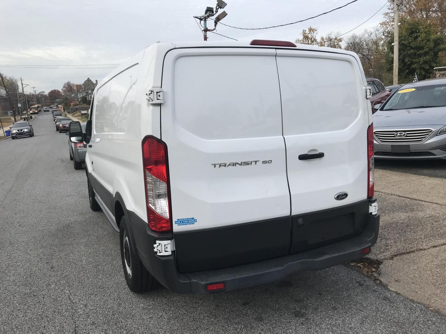 2016 White /Gray Ford Transit 150 Van Low Roof 60/40 Pass. 130-in. WB (1FTYE1ZM7GK) with an 3.7L V6 DOHC 24V engine, 6A transmission, located at 577 Chester Pike, Prospect Park, PA, 19076, (610) 237-1015, 39.886154, -75.302338 - Photo#3