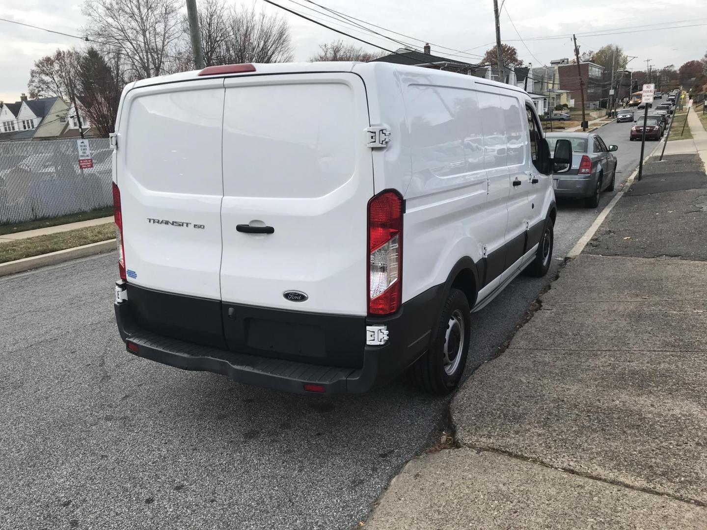 2016 White /Gray Ford Transit 150 Van Low Roof 60/40 Pass. 130-in. WB (1FTYE1ZM7GK) with an 3.7L V6 DOHC 24V engine, 6A transmission, located at 577 Chester Pike, Prospect Park, PA, 19076, (610) 237-1015, 39.886154, -75.302338 - Photo#4