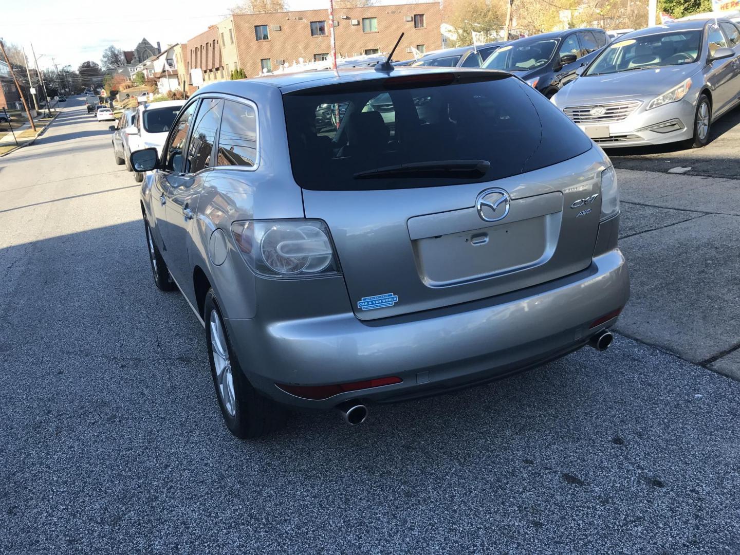 2011 Gray /Gray Mazda CX-7 s Touring AWD (JM3ER4CL3B0) with an 2.3L L4 DOHC 16V TURBO engine, 6-Speed Automatic transmission, located at 577 Chester Pike, Prospect Park, PA, 19076, (610) 237-1015, 39.886154, -75.302338 - Photo#5