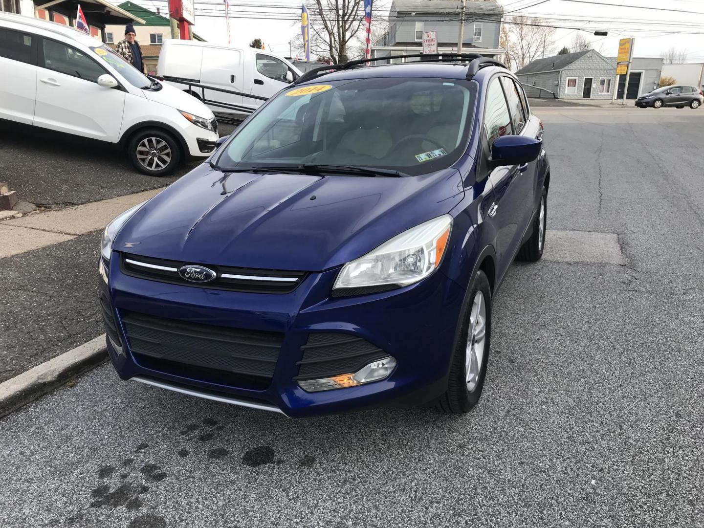 2014 Blue /Gray Ford Escape SE (1FMCU0GX7EU) with an 1.6L L4 DOHC 16V engine, 6-Speed Automatic transmission, located at 577 Chester Pike, Prospect Park, PA, 19076, (610) 237-1015, 39.886154, -75.302338 - 2014 Ford Escape SE: Only 93k miles, backup camera, new PA inspection, great on gas, looks and runs LIKE NEW! This vehicle comes inspected and has been given a bumper to bumper safety check. It is very clean, reliable, and well maintained. We offer a unique pay plan that is known for being the ea - Photo#2