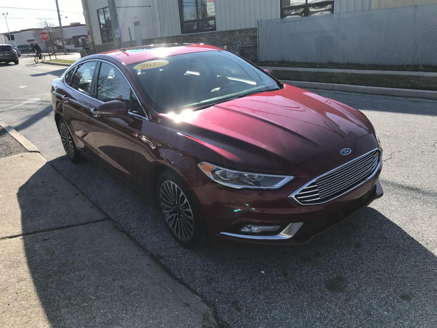 2018 Red /Black Ford Fusion Titanium AWD (3FA6P0D96JR) with an 2.0L L4 DOHC 16V engine, 6A transmission, located at 577 Chester Pike, Prospect Park, PA, 19076, (610) 237-1015, 39.886154, -75.302338 - 2018 Ford Fusion Titanium: AWD, navigation system, sunroof, backup camera, new PA inspection, great on gas, SUPER CLEAN, runs LIKE NEW! This vehicle comes inspected and has been given a bumper to bumper safety check. It is very clean, reliable, and well maintained. We offer a unique pay plan that - Photo#1