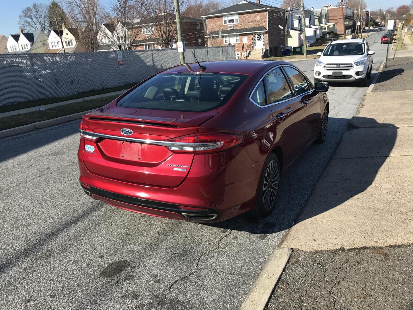 2018 Red /Black Ford Fusion Titanium AWD (3FA6P0D96JR) with an 2.0L L4 DOHC 16V engine, 6A transmission, located at 577 Chester Pike, Prospect Park, PA, 19076, (610) 237-1015, 39.886154, -75.302338 - 2018 Ford Fusion Titanium: AWD, navigation system, sunroof, backup camera, new PA inspection, great on gas, SUPER CLEAN, runs LIKE NEW! This vehicle comes inspected and has been given a bumper to bumper safety check. It is very clean, reliable, and well maintained. We offer a unique pay plan that - Photo#4