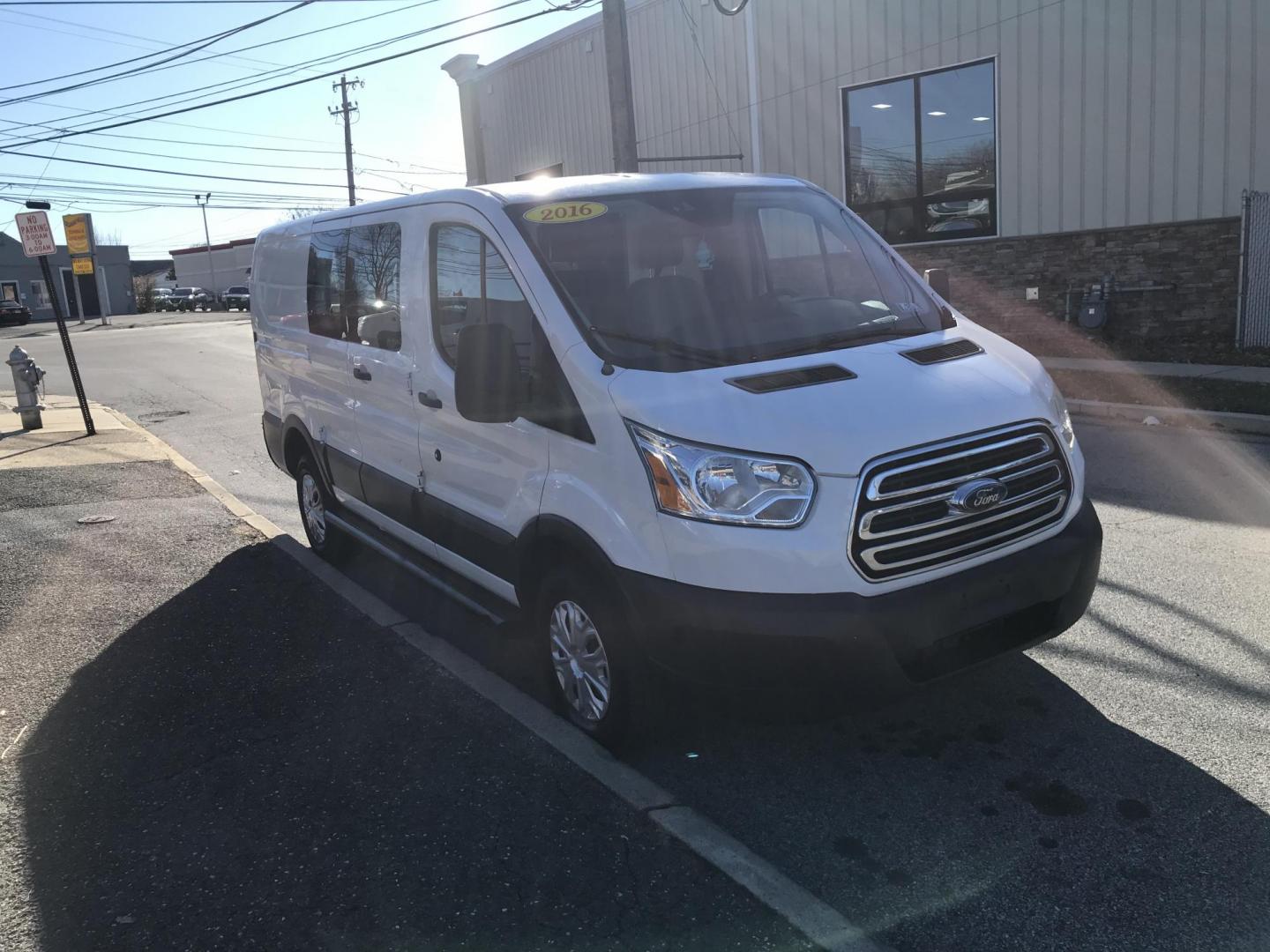 2016 White /Gray Ford Transit 250 Van Low Roof 60/40 Pass.130-in. WB (1FTYR1ZM7GK) with an 3.7L V6 DOHC 24V engine, 6A transmission, located at 577 Chester Pike, Prospect Park, PA, 19076, (610) 237-1015, 39.886154, -75.302338 - 2016 Ford Transit 250 Low Roof: shelving, new PA inspection, partition, FLEET MAINTAINED, runs LIKE NEW! This vehicle comes inspected and has been given a bumper to bumper safety check. It is very clean, reliable, and well maintained. We offer a unique pay plan that is known for being the easiest - Photo#2