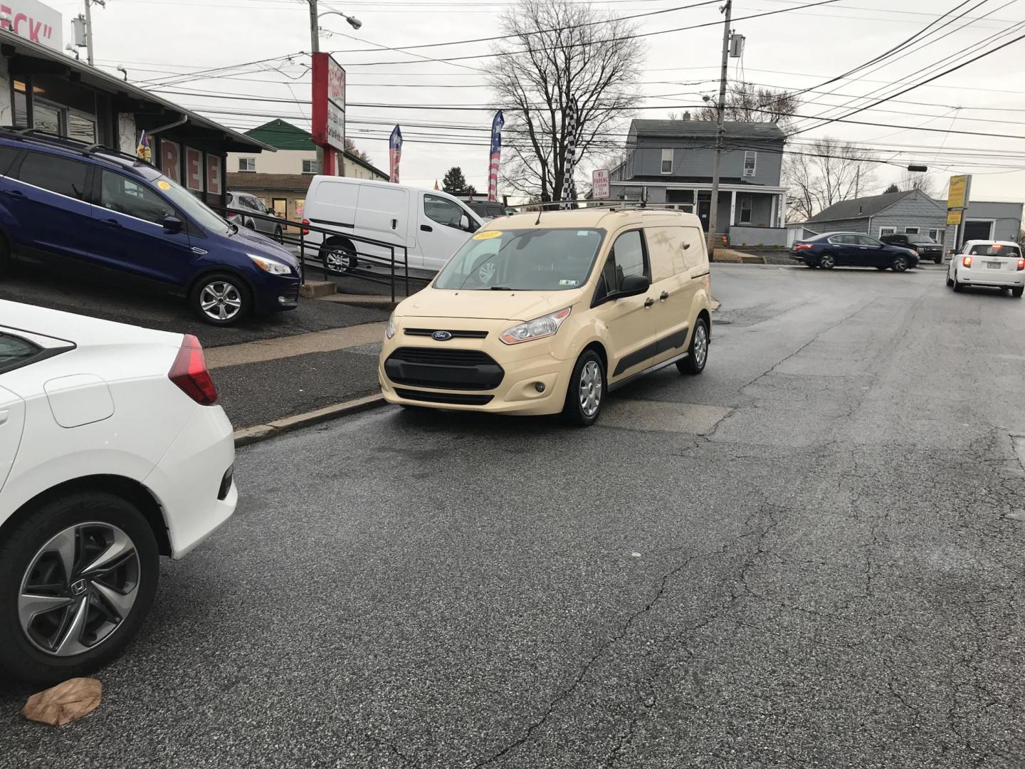 2017 Tan /Gray Ford Transit Connect Cargo Van XLT (NM0LS7F74H1) with an 2.5L L4 DOHC 16V engine, 6A transmission, located at 577 Chester Pike, Prospect Park, PA, 19076, (610) 237-1015, 39.886154, -75.302338 - Photo#1