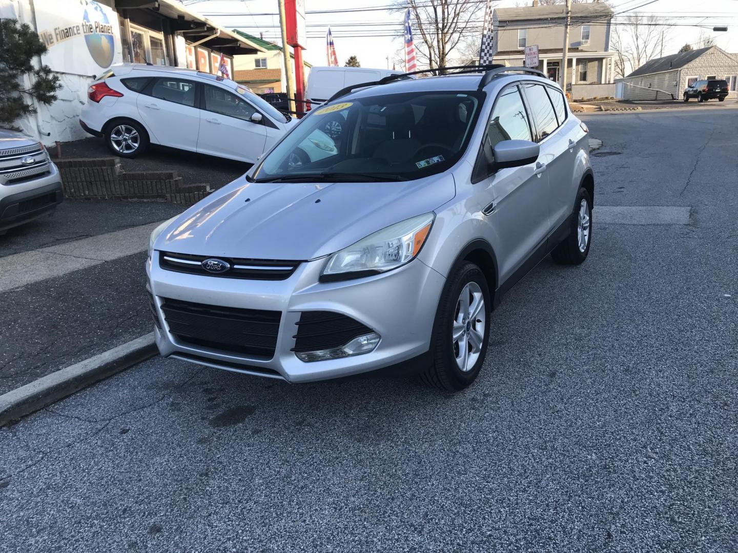 2013 Silver /Gray Ford Escape SE (1FMCU0GX9DU) with an 1.6L L4 DOHC 16V engine, 6-Speed Automatic transmission, located at 577 Chester Pike, Prospect Park, PA, 19076, (610) 237-1015, 39.886154, -75.302338 - Photo#1