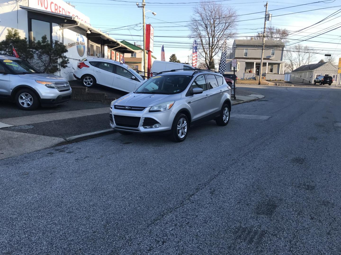 2013 Silver /Gray Ford Escape SE (1FMCU0GX9DU) with an 1.6L L4 DOHC 16V engine, 6-Speed Automatic transmission, located at 577 Chester Pike, Prospect Park, PA, 19076, (610) 237-1015, 39.886154, -75.302338 - Photo#2